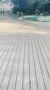 Spa wet area composite decking with water on it